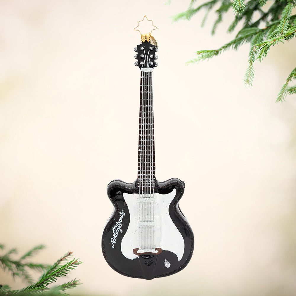 The Stones' Strummer. A black and white guitar ornament from the Rolling Stones. View of front