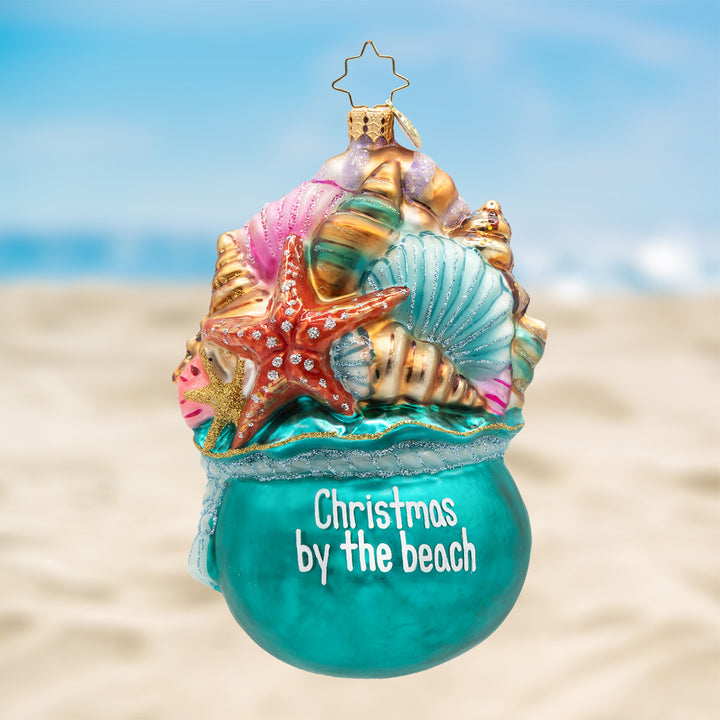 Decorative ornament with shells and starfish on a beach background