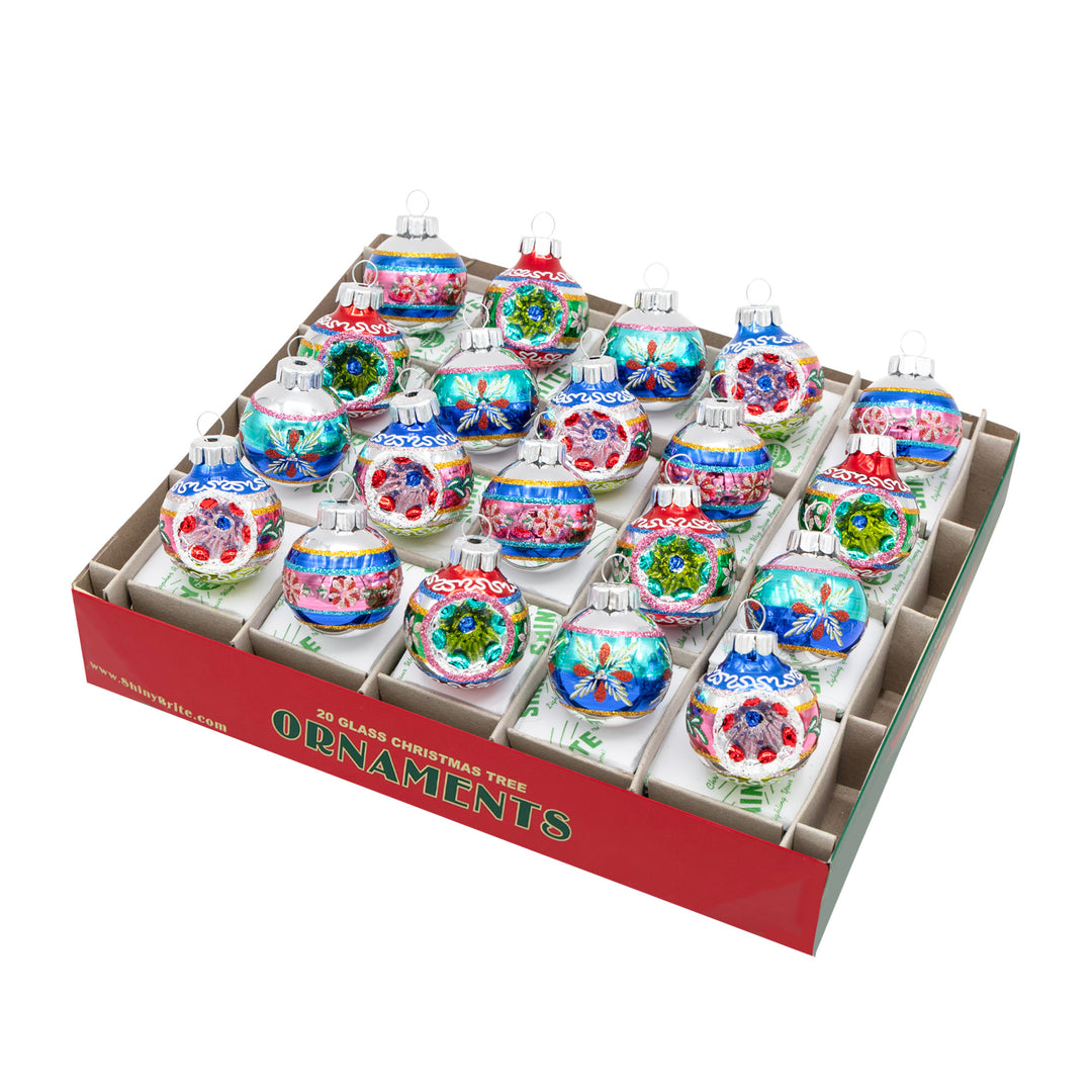 CHRISTMAS CONFETTI 20 COUNT 1.25" HALF REFLECTOR HALF ROUNDS. Silver round ornaments with stipes, detailing, and gems in colors of red, pink, blue, green, and yellow
