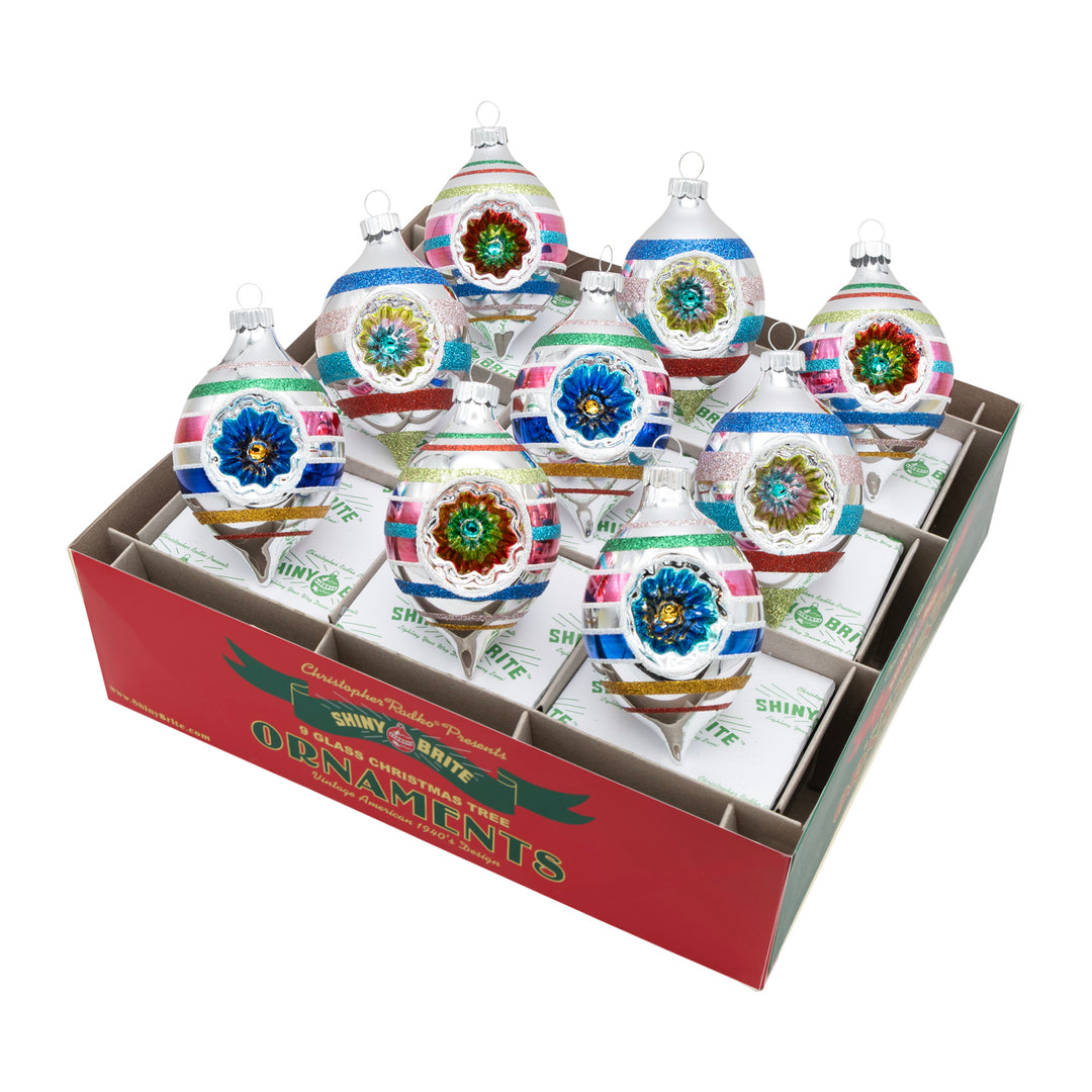 CHRISTMAS CONFETTI 9 COUNT 2.5" REFLECTOR TULIPS. Nine silver round tear-shaped ornaments with stripes of red, green, pink, and blue
