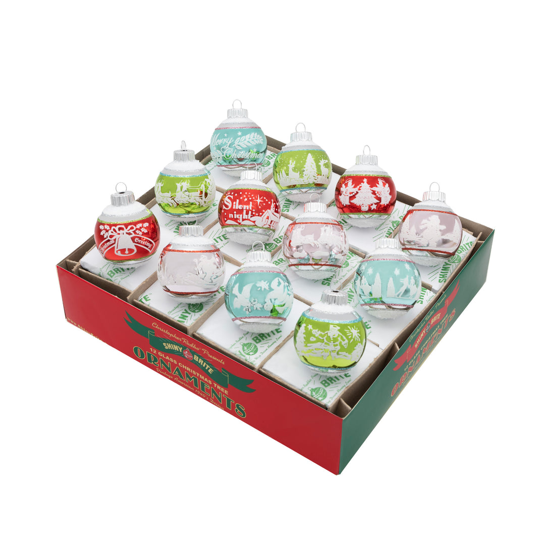 FESTIVE FETE 12 COUNT 1.75" SIGNATURE FLOCKED ROUNDS. Twelve round ornaments with a big stripe ranging from colors of red, pink, green, and teal, and each with its own design.
