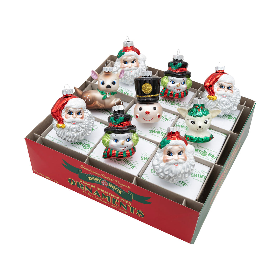 HOLIDAY SPLENDOR 9 COUNT 2.5" FIGURES. Four ornaments in the shape of Santas head, two snowman shaped ornaments, two dear ornaments, one full body and one head, and a nutcracker head