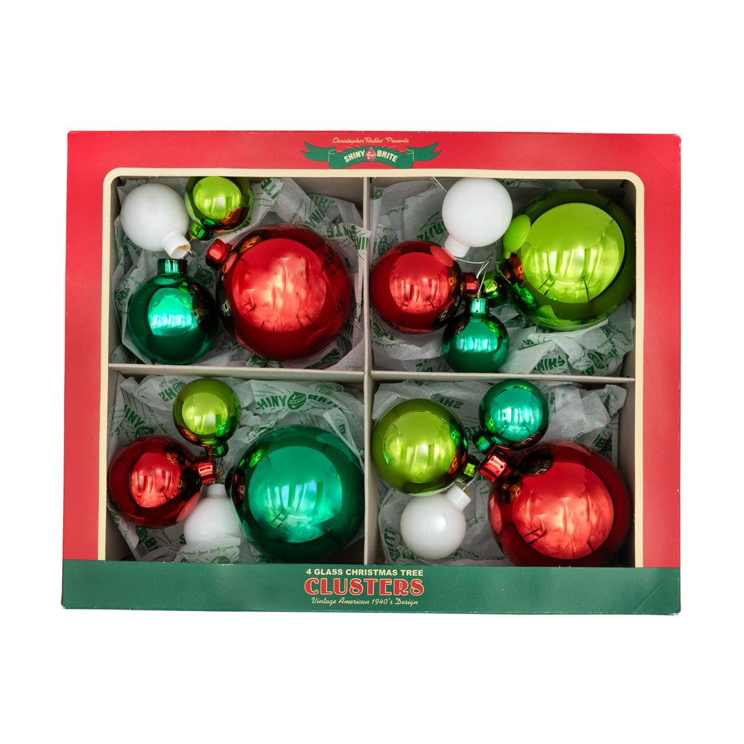 HOLIDAY SPLENDOR 8 COUNT 4PC 1.25",1.75" & 2.5" CLUSTERS. four cluster of five different sized ornaments in colors of red, dark and light green, and white