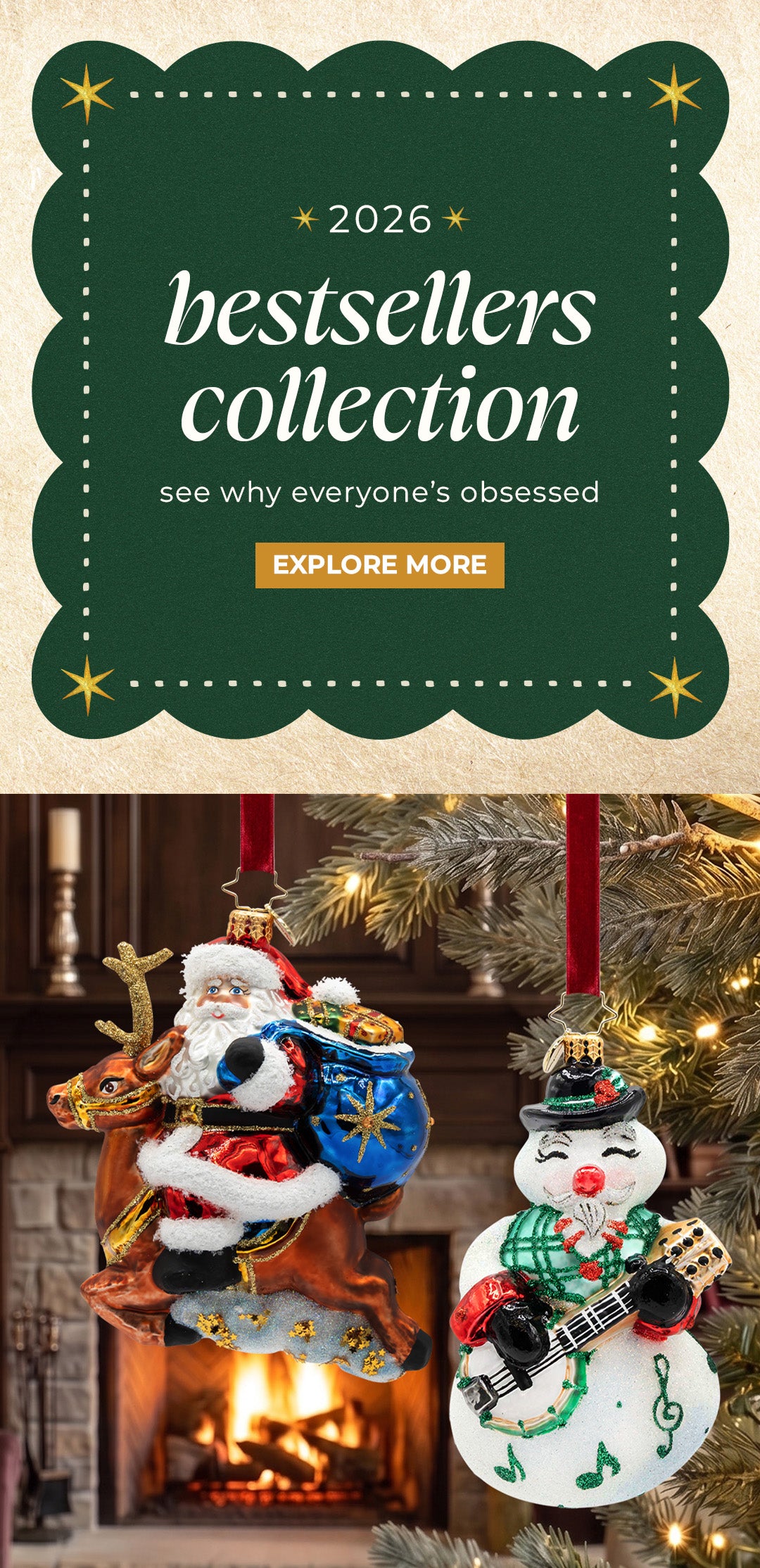 Promotional banner reading "2026 bestsellers collection - see why everyone’s obsessed - EXPLORE MORE" alongside glass Christmas ornaments of Santa riding a reindeer and a musical snowman.