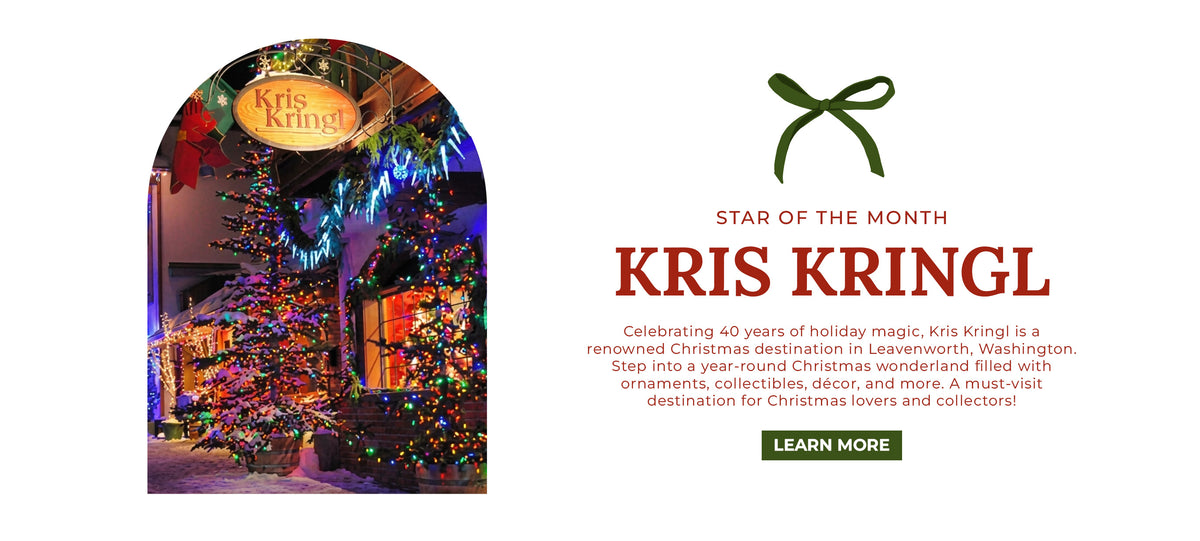 Promotional banner for Kris Kringl in Leavenworth, WA, featuring an arched photo of the storefront at night, decorated with multi-colored Christmas trees, icicle lights, and a hanging Kris Kringl sign, with text reading: "STAR OF THE MONTH. KRIS KRINGL. Celebrating 40 years of holiday magic... A must-visit destination for Christmas lovers and collectors!"