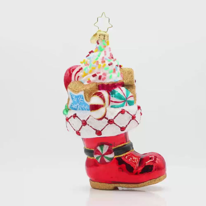 Candy Cane Kick ornament. Features Santa’s classic red boot, brimming with sweet treats. Video.