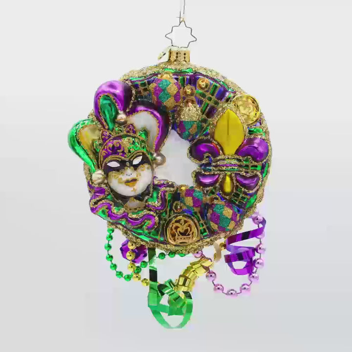 Mardi Gras Majesty ornament. This festive Mardi Gras wreath features vibrant colors, intricate details, and playful elements. Video.