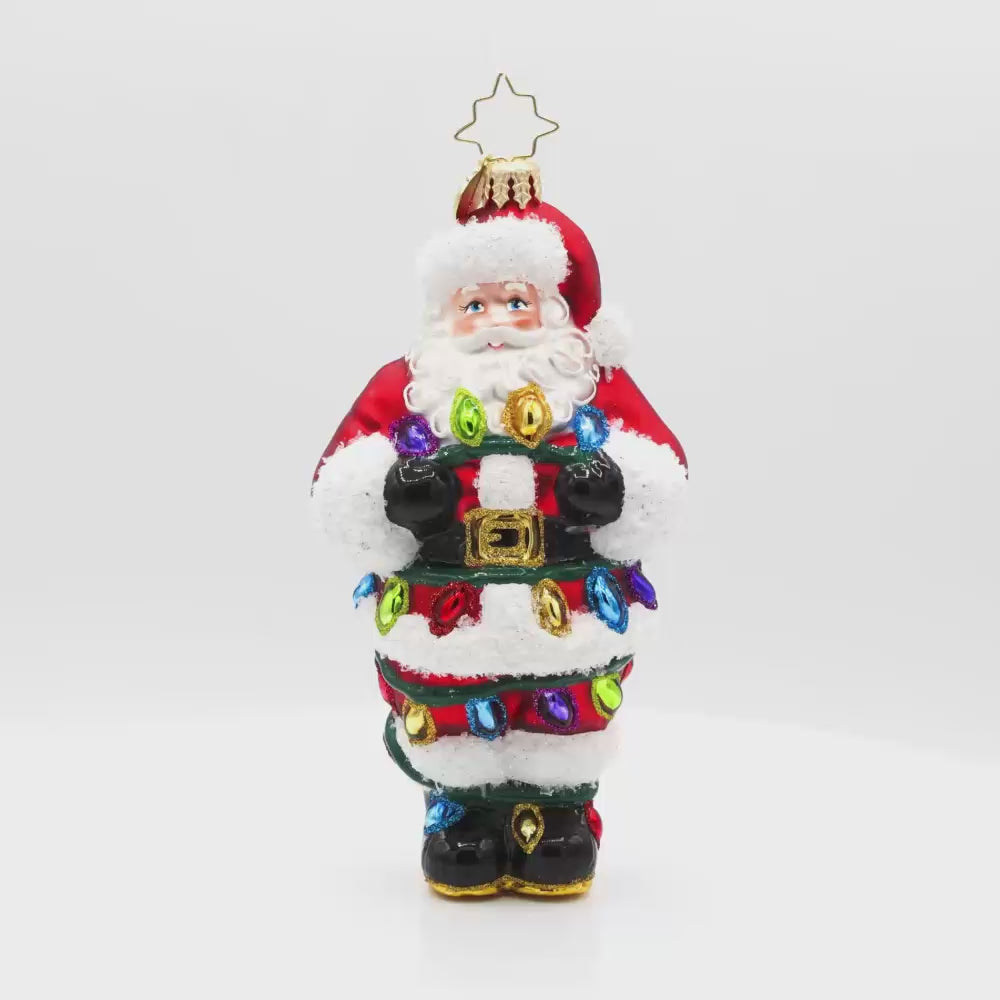 Tangled Up Santa ornament. This Santa's caught in a colorful mess of Christmas lights. Video.