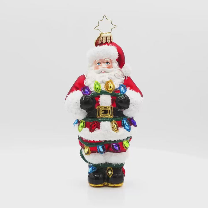 Tangled Up Santa ornament. This Santa's caught in a colorful mess of Christmas lights. Video.