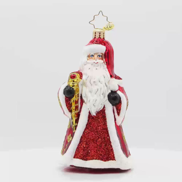 Jubilee Gent ornament. Santa is dressed in a regal red robe with his shiny scepter and festive cape. Video.