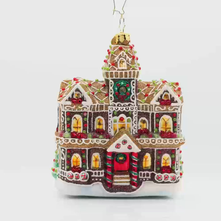 Gingerbread Manor ornament. With candy details and frosting accents on this gingerbread house. Video.