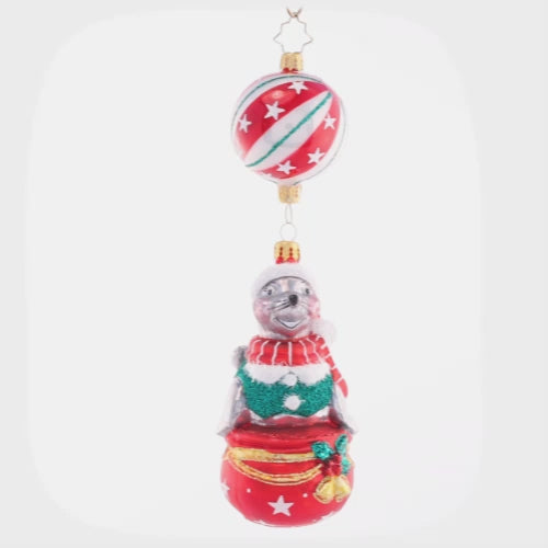 Video - Ornament Description - It's A Seal-abration: This seal donning a Santa hat can be the star of the show on your tree this year. Perfectly balanced, he won't drop the ball! This video shows the ornament slowly spinning.