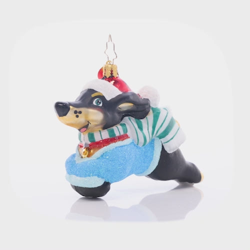 Video - Ornament Description - Santa Paws: Dog gone! This prancing pooch is looking cheerful as ever in a Christmas sweater and Santa hat.