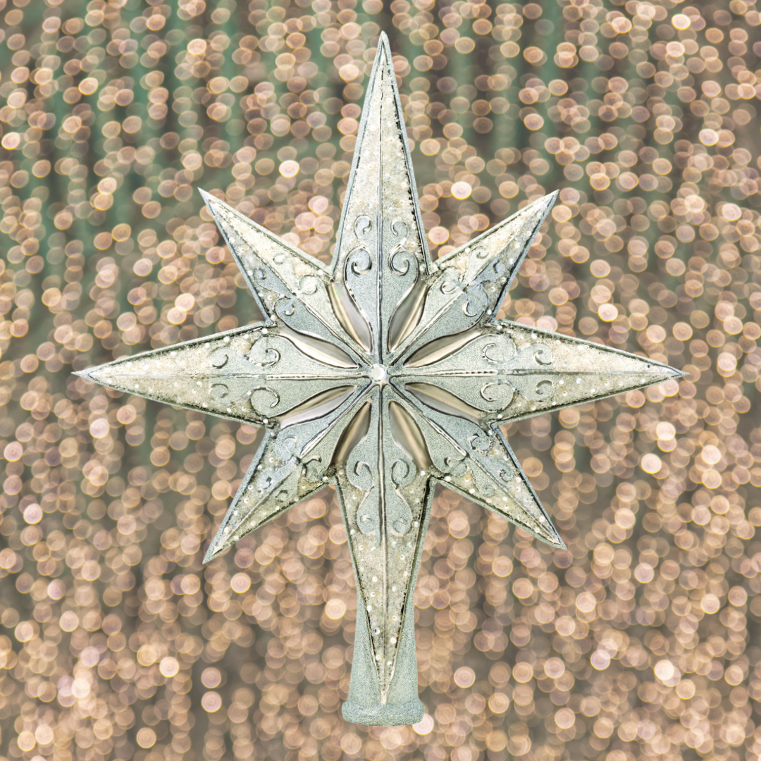 Finial Description - Silver Stellar: Be sure to hang this glistening star upon the very highest bough! This incandescent tree-topper is a wonderful complement to a tree filled with festive ornaments.