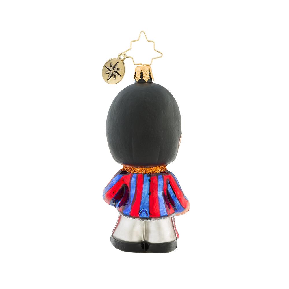 Back - Ornament Description - Still a Star: Slightly quirky yet always fun, Ringo was the lighthearted one. Dramatic, flamboyant, and full of flair, on the ground or in the air--what a Starr!