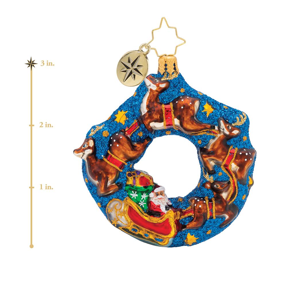 Ornament Description - Santa's Midnight Ride Gem: Flying through the midnight sky, Santa and his reindeer partners are ready to deliver gifts this Christmas Eve! This photo shows the ornament is about 3 inches tall.