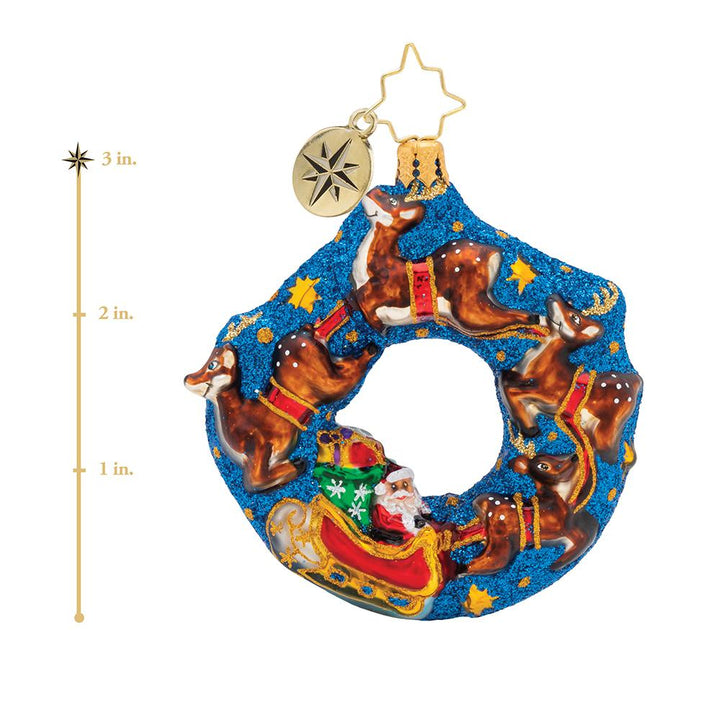 Ornament Description - Santa's Midnight Ride Gem: Flying through the midnight sky, Santa and his reindeer partners are ready to deliver gifts this Christmas Eve! This photo shows the ornament is about 3 inches tall.