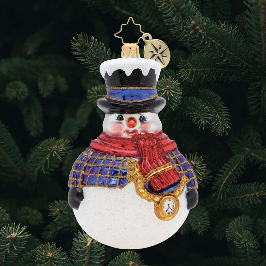 Ornament Description - Jolly All A-Round Snowman!: Round and round, he rolls! Our dapper snowman is ready for winter with his warm red scarf and adorable top hat!