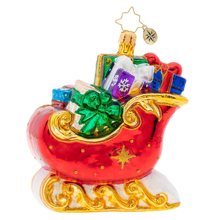 Back - Ornament Description - Sleigh Full of Delights!: What a Brilliant Treasure! This bright red Christmas sleigh is adorned with golden accents and topped with lovely gifts wrapped with care.