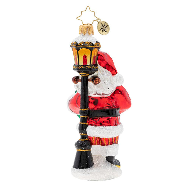 Back - Ornament Description - Celebrate 2019 Snata!: Santa stands under a classic light post with a holly wreath surrounding the celebration of 2019! What a memorable keepsake for a grand 2019 year!