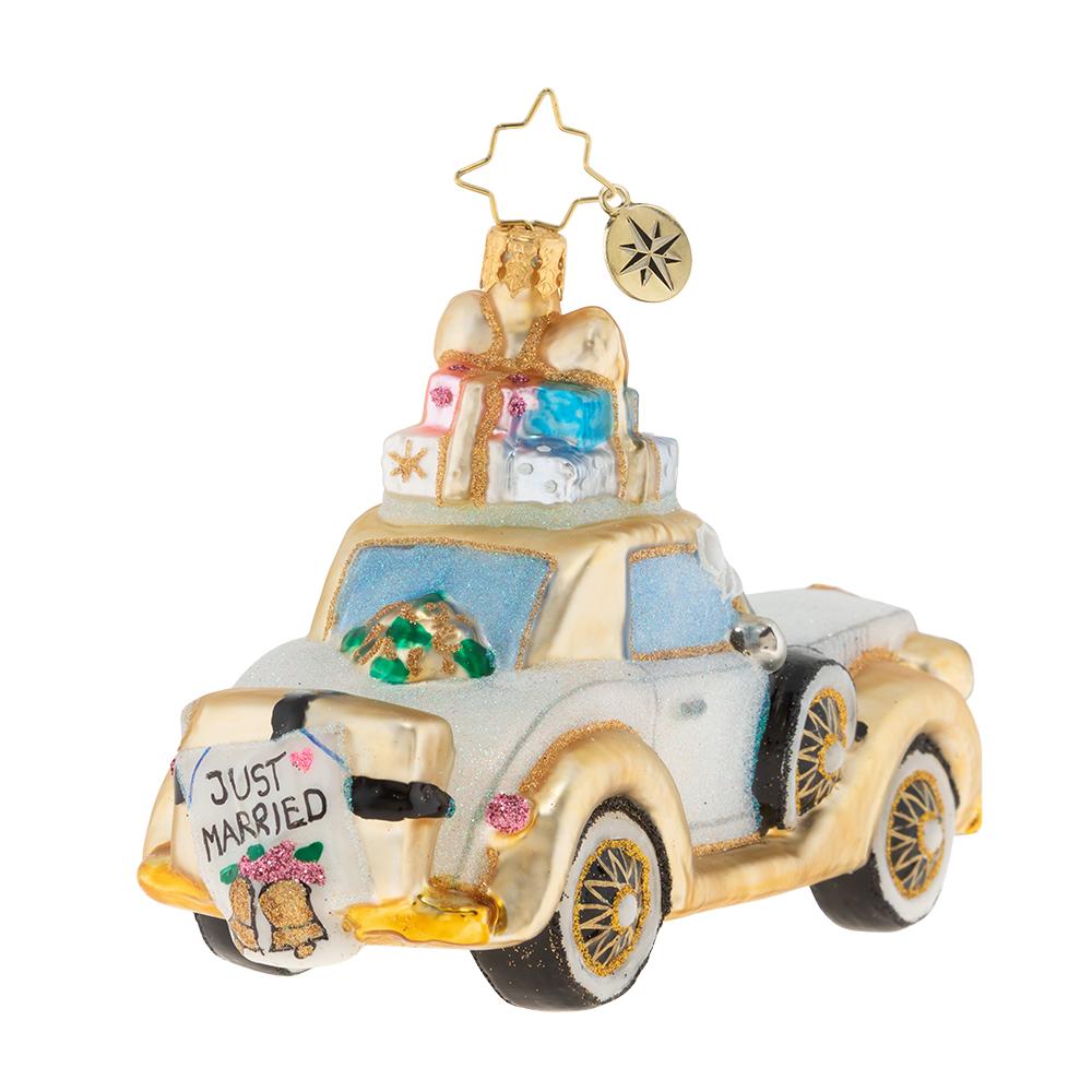 Back - Ornament Description: 2019 Wedding Bliss Chariot - The happy couple takes off after their wedding in this wedding bliss chariot! Their gifts stacked high atop the roof and their bags packed for a honeymoon of memories at the back, this loving couple is ready for their happily ever after!
