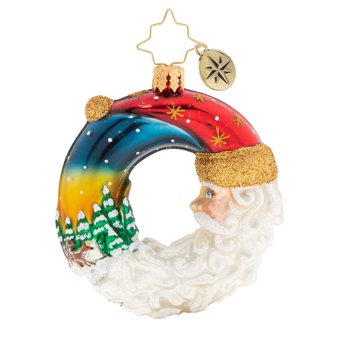 Back - Ornament Description - Santa's Silent Night Wreath Gem: A night both silent and stunning. Santa basks in a brilliant sunset as the sun gives way to the moon.