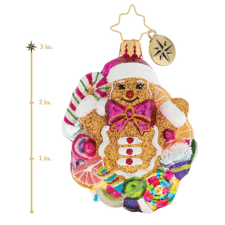 Ornament Description - Popping Out Surprise Gem: Surprise! The gingerbread man has arrived. And he's bursting with delight that Christmas is almost here. This photo shows the ornament is about 3 inches tall. 