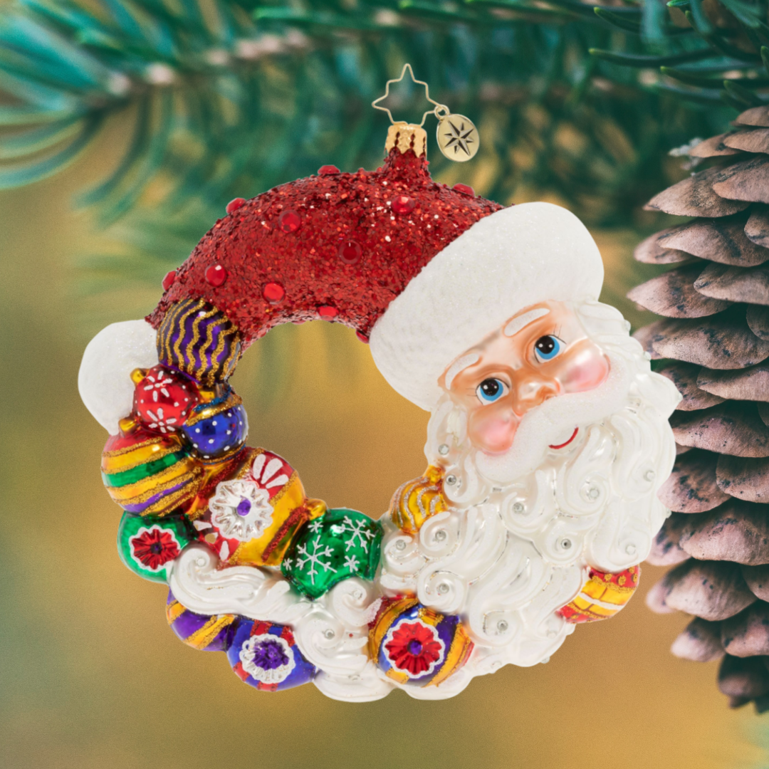 Ornament Description - Santa Comes Full Circle Wreath: Santa can't believe another Christmas has come full circleâ€”he's checked off his entire to-do list and tied up all his loose ends! He'll get right on planning for next year, but first, he's going to relax with family and friends.