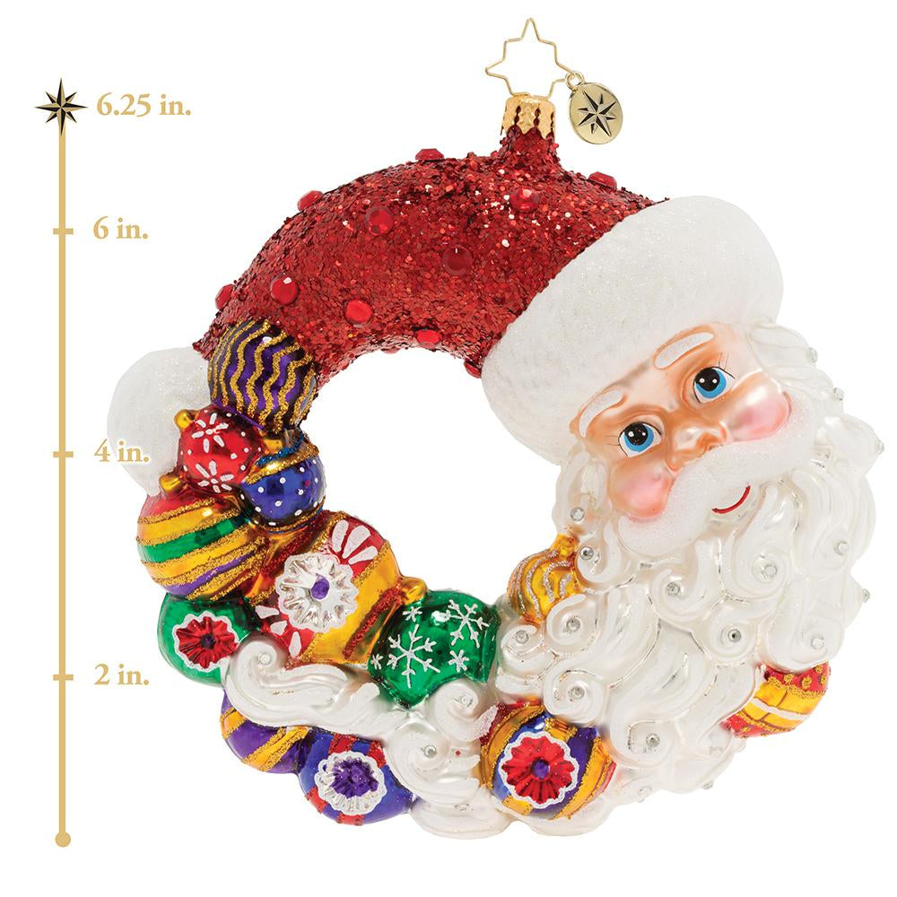Ornament Description - Santa Comes Full Circle Wreath: Santa can't believe another Christmas has come full circleâ€”he's checked off his entire to-do list and tied up all his loose ends! He'll get right on planning for next year, but first, he's going to relax with family and friends. This photo shows the ornament is about 6.25 inches tall