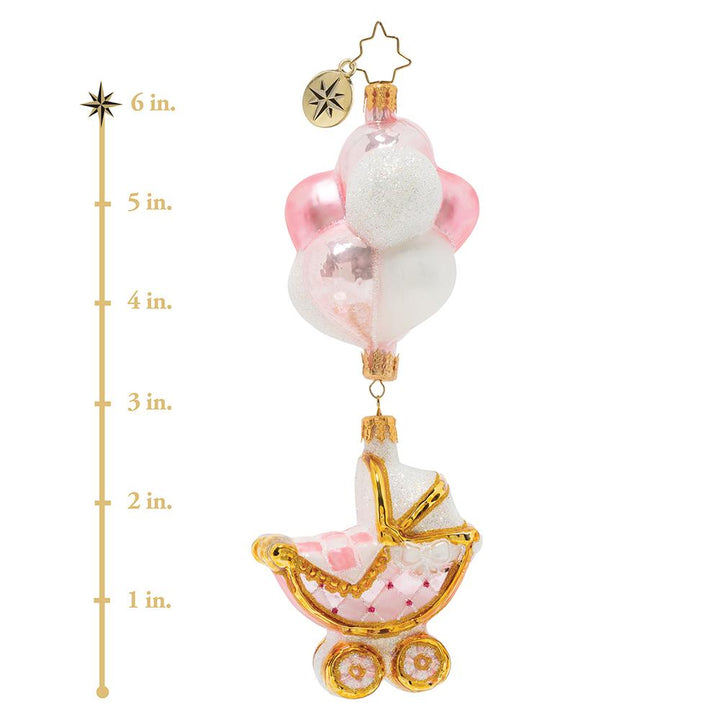 Ornament Description - Baby Girl Buggy & Balloons: What's beautiful, sweet, and as precious as a pearl? It's a gift like no otherâ€”it's a lovely newborn baby girl. This photo shows the ornament is 6 inches tall.