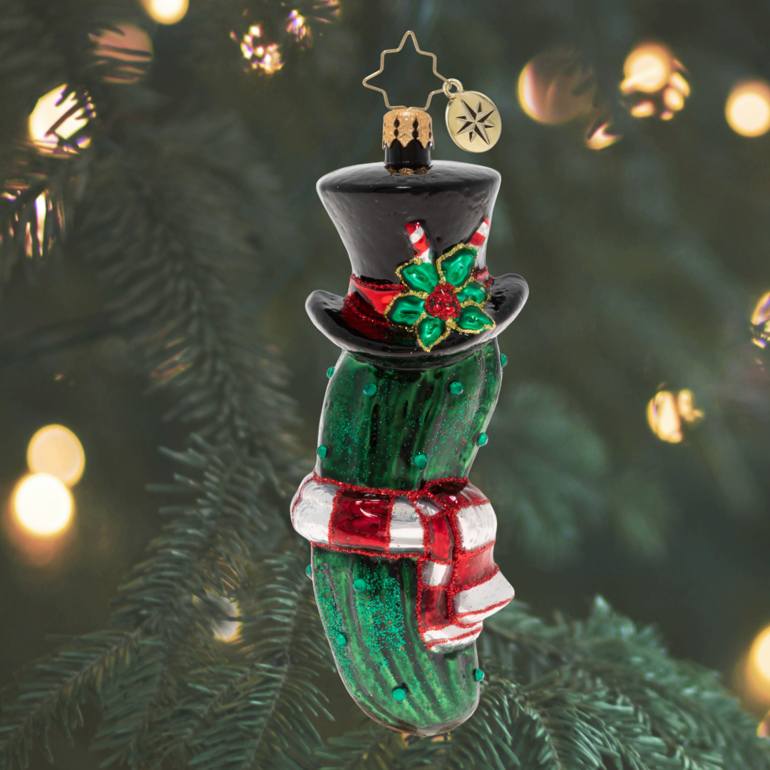 Ornament Description - The Christmas Pickle: Sure, he's sour, and a little bit sweet! This festive pickle might be decorative but man, does he look good enough to eat.