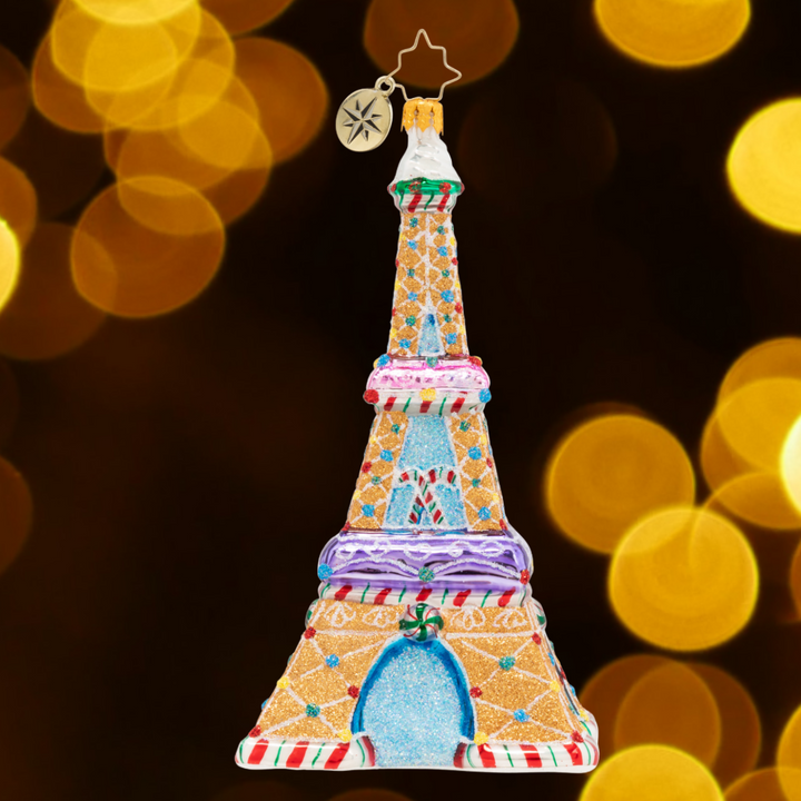 Ornament Description - Paris is Sweet: Goodness gracious! Sacre bleu! The Eiffel Tower's totally laced in candy, now it's even sweeter to view.