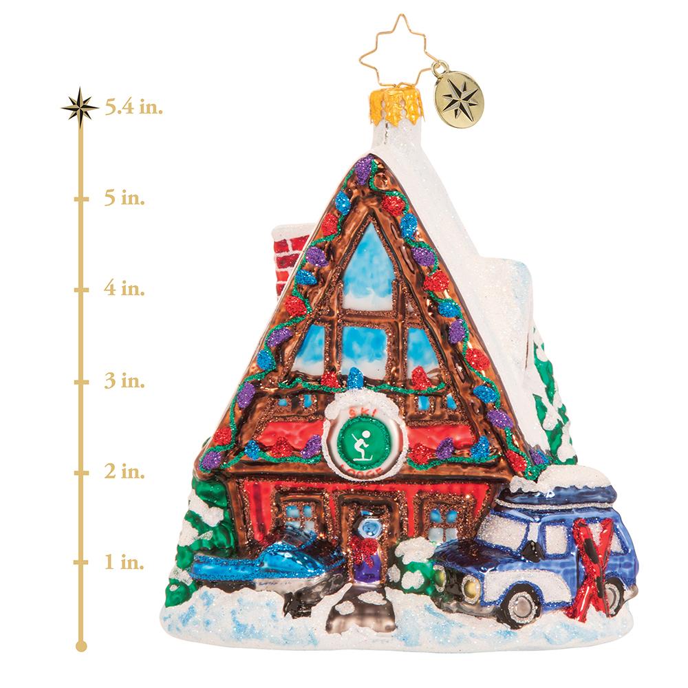Ornament Description - Hillside for the Holidays: Dry off those mittens, meet new friends, and warm up with a cup hot cocoa or herbal tea. The lodge is the coziest place to unwind aprÃ¨s-ski. This photo shows the ornament is about 5.4 inches tall. 