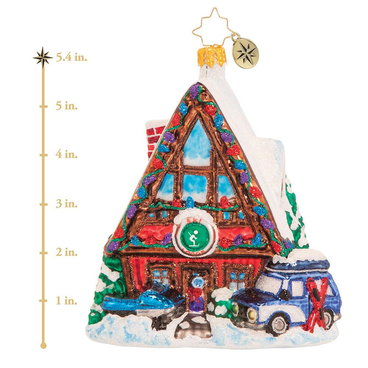 Ornament Description - Hillside for the Holidays: Dry off those mittens, meet new friends, and warm up with a cup hot cocoa or herbal tea. The lodge is the coziest place to unwind aprÃ¨s-ski. This photo shows the ornament is about 5.4 inches tall. 