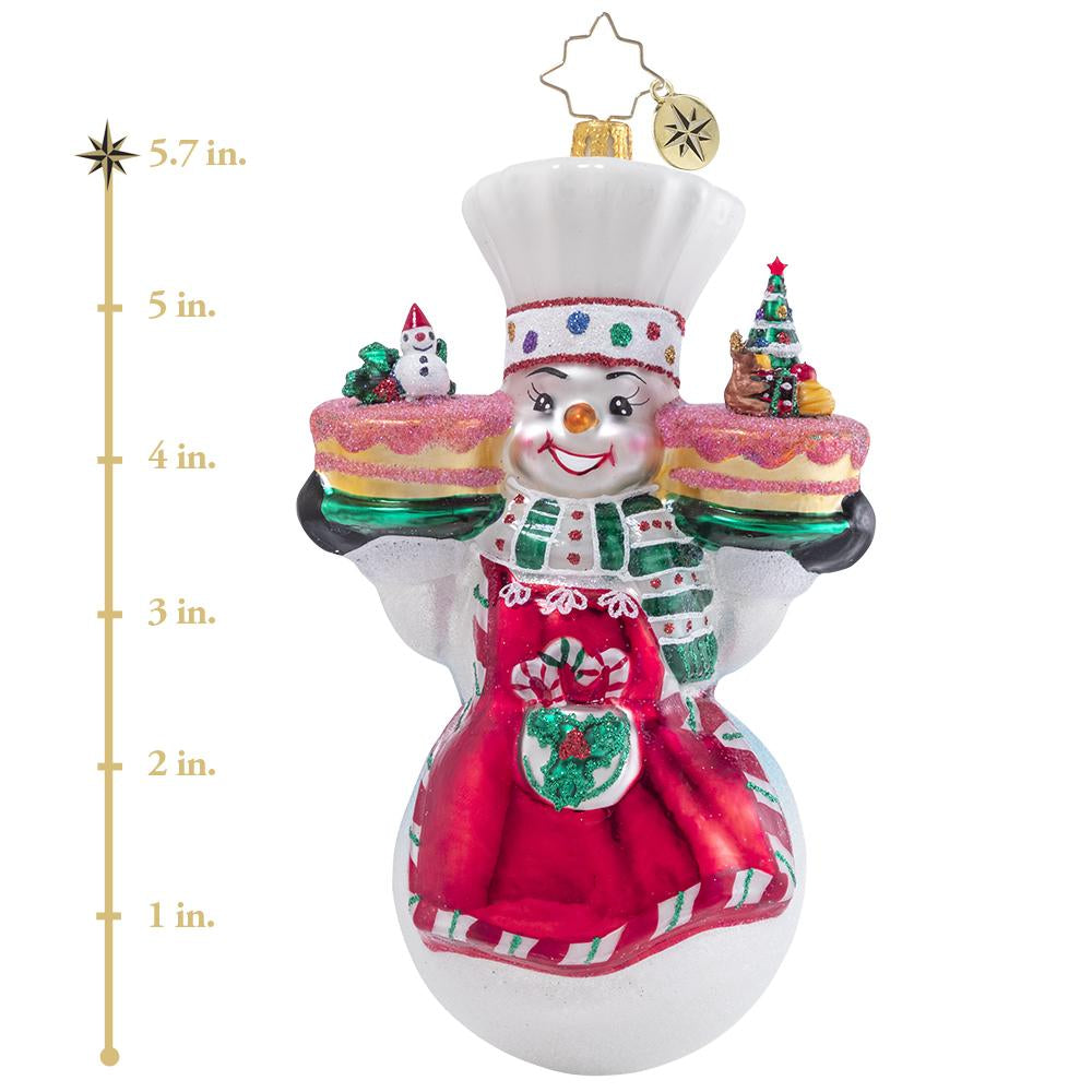 Ornament Description - This Christmas Takes The Cake!: Mr. Snowman has been hard at work in his magical bakery, whipping up all types of sweets as the holidays draw near. These Christmas cakes are sure to fly off the shelves--no one can resist his frosty treats! This photo shows the ornament is about 5.7 inches tall. 