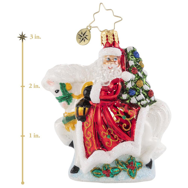 Ornament Description - Galloping into Christmas Gem: Giddy up! Santa is riding into town atop his trusty snowy steed. Do not let his small stature fool you--this little guy has serious horsepower! This photo shows the ornament is about 3 inches tall.