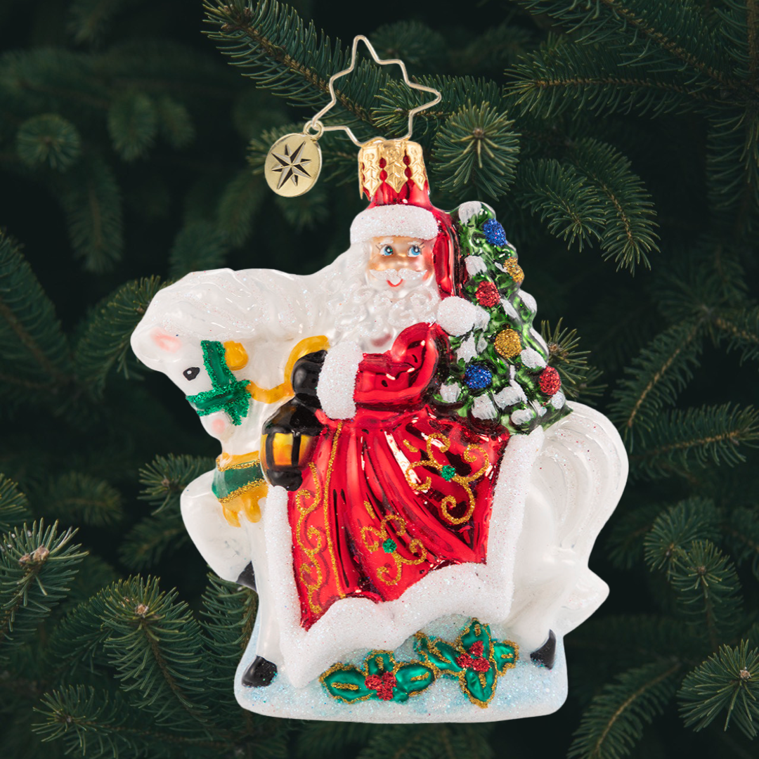 Ornament Description - Galloping into Christmas Gem: Giddy up! Santa is riding into town atop his trusty snowy steed. Do not let his small stature fool you--this little guy has serious horsepower!