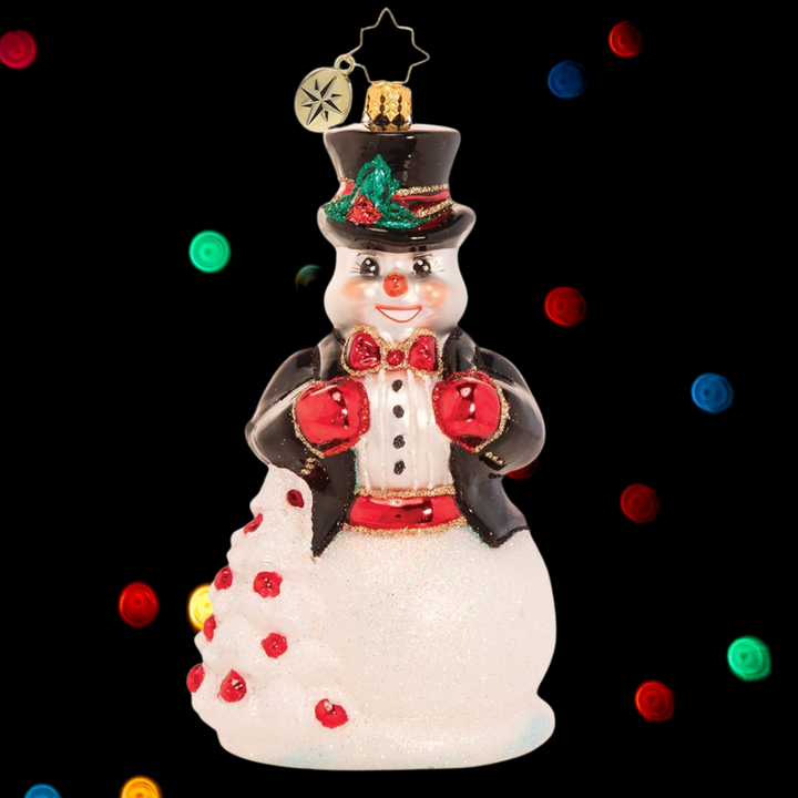 Ornament Description - High-Fashion Frosty: In his top hat and tails, Frosty is dressed to impress. He is all spiffed up for the North Pole Christmas ball and is looking for love. Will tonight be the night his Christmas wish comes true?