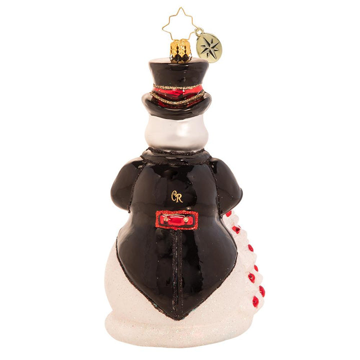 Back - Ornament Description - High-Fashion Frosty: In his top hat and tails, Frosty is dressed to impress. He is all spiffed up for the North Pole Christmas ball and is looking for love. Will tonight be the night his Christmas wish comes true?
