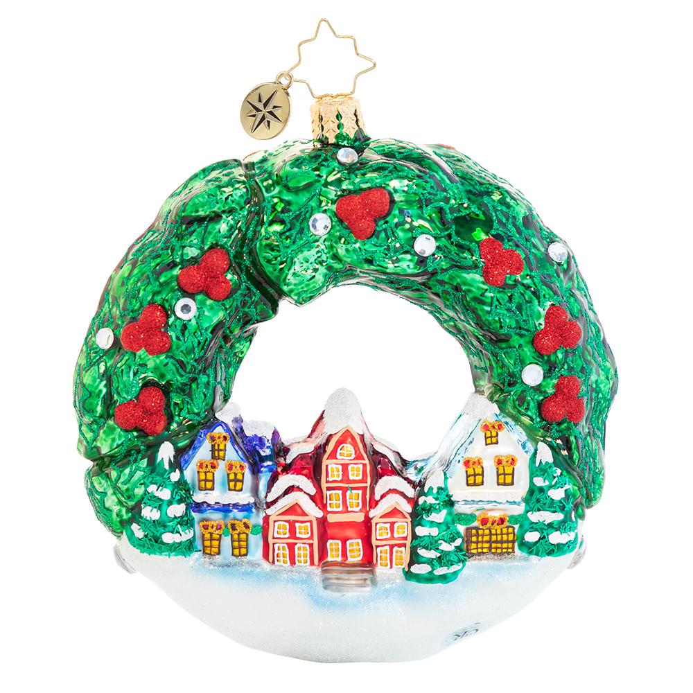 Back - Ornament Description - An All-Around Christmas Town!: Frosty's festive holiday village is ready for the most magical time of year, glowing under a traditional fresh holly swag. The villagers cannot wait to hear the first carolers of the season!