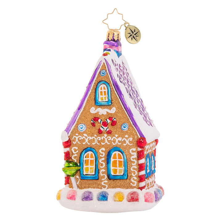 Back - Ornament Description - The Confectioner's Chalet: Nestled right on Candy Cane Lane, this gingerbread house is confection perfection! Rumor has it, it is home to the town candymaker--no wonder it is so sweet! 