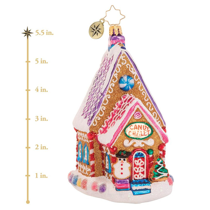 Ornament Description - The Confectioner's Chalet: Nestled right on Candy Cane Lane, this gingerbread house is confection perfection! Rumor has it, it is home to the town candymaker--no wonder it is so sweet! This photo shows the ornament is about 5.5 inches tall. 