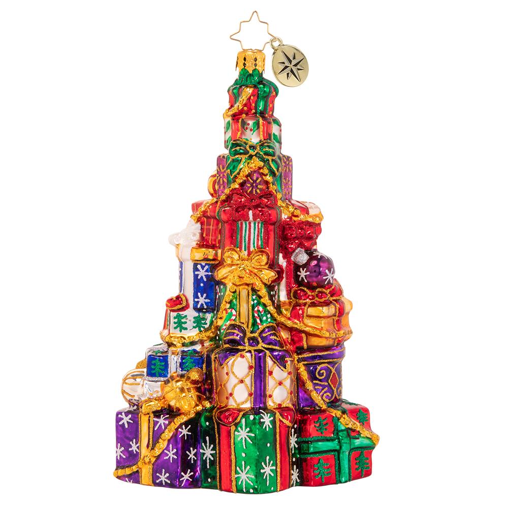 Ornament Description - Abounding Presents: Someone has been VERY good this year! This supersized pile of presents seems to get higher with every Christmas that goes by!