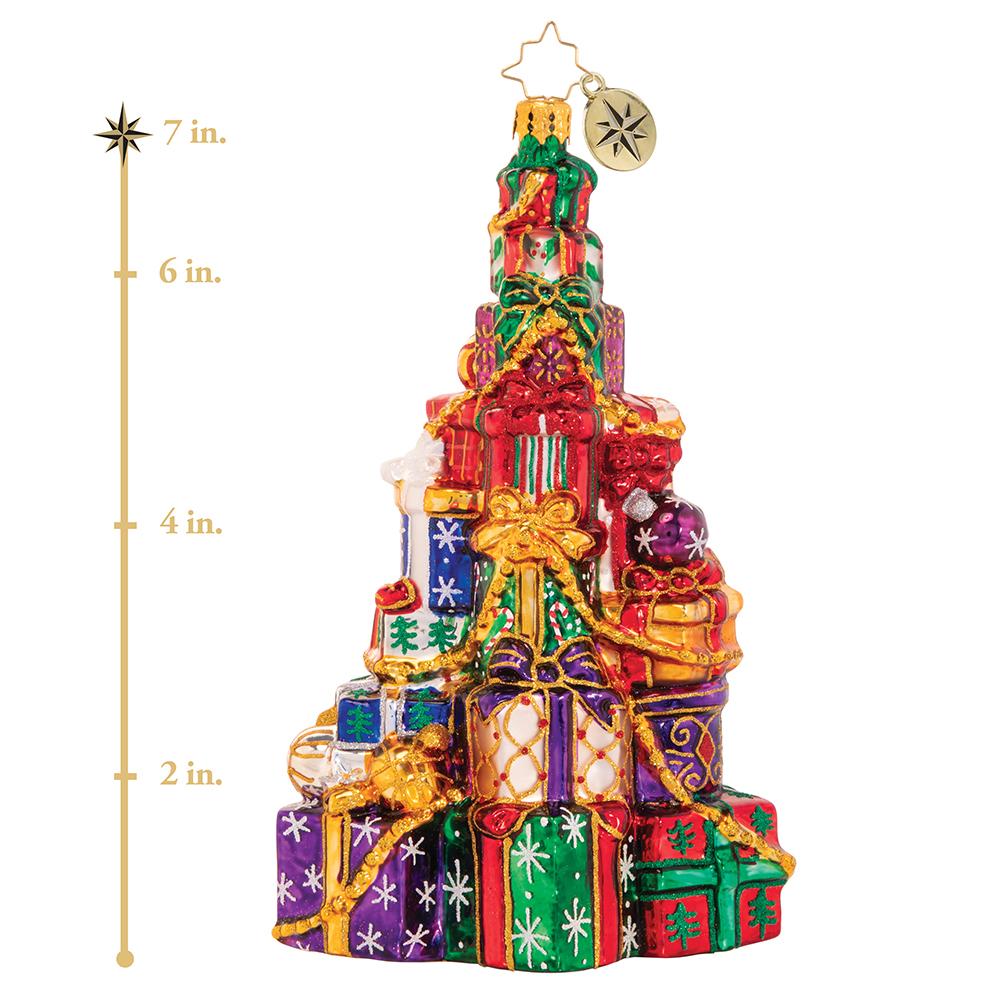 Ornament Description - Abounding Presents: Someone has been VERY good this year! This supersized pile of presents seems to get higher with every Christmas that goes by! This photo shows the ornament is about 7 inches tall.