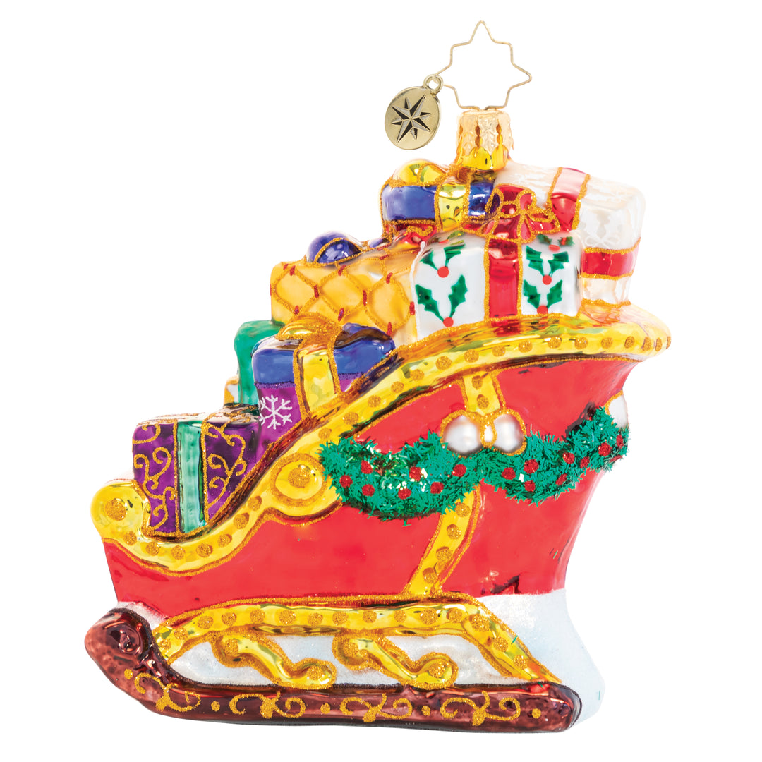 Back - Ornament Description - Joyful Journey Sleigh: The reindeer sure do have their work cut out for them; this sleigh is seriously packed! Overflowing with gifts, it is going to be one seriously hefty haul, but they will do whatever it takes to get Christmas delivered on time!
