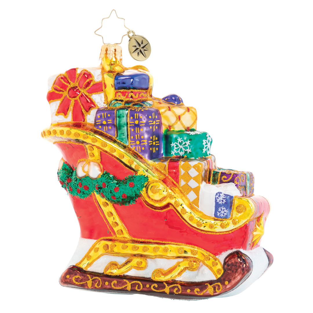 Front - Ornament Description - Joyful Journey Sleigh: The reindeer sure do have their work cut out for them; this sleigh is seriously packed! Overflowing with gifts, it is going to be one seriously hefty haul, but they will do whatever it takes to get Christmas delivered on time!