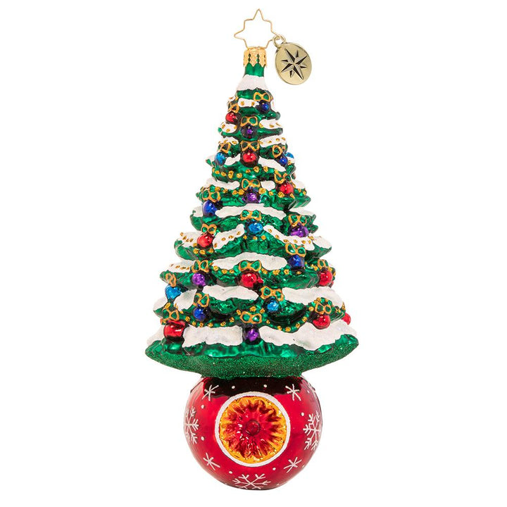 Ornament Description - A Beautifully Balanced Tree: We are pine-ing for Christmas! A frosted fir sits perfectly perched atop a resplendent ruby-red holiday bauble.