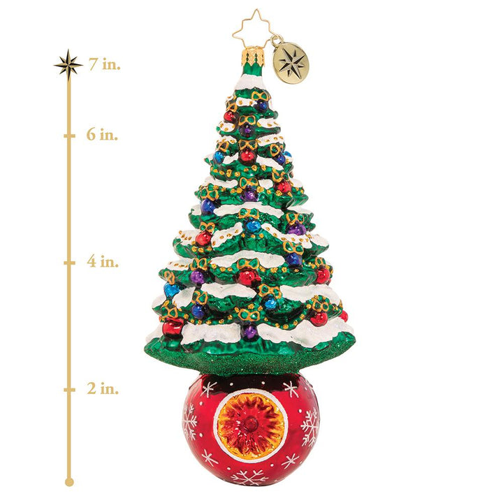 Ornament Description - A Beautifully Balanced Tree: We are pine-ing for Christmas! A frosted fir sits perfectly perched atop a resplendent ruby-red holiday bauble.