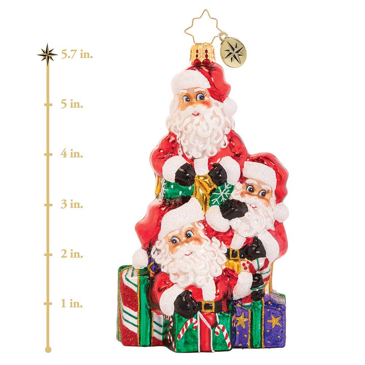 Ornament Description - A Tremendous Trio of Santas: Good things come in threes! It is not easy to get all the way around the world in a single night, so Santa used a little Christmas magic to clone himself a few extra pairs of hands this year. This photo shows the ornament is about 5.7 inches tall.