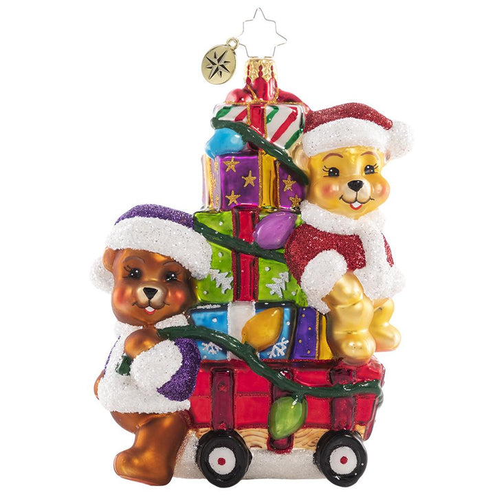 Front - Ornament Description - Toting Treasure Teddies: Wishing you a very bear-y Christmas! These precious plushies are riding in style on their little red wagon piled high with toys and Christmas joy!